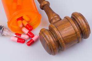 prescription medication and a gavel