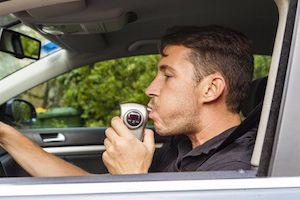 a man using a breathalyzer