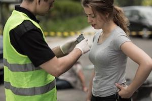 Close view of police officer conducting DUI testing